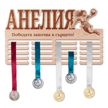 Поставка за медали - Хандбал, Жена